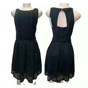 NWT Rewind Sleeveless dress with lace on the front